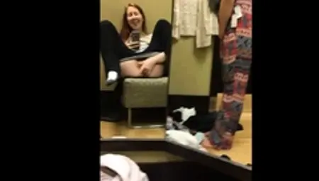 Young Amateur Redhead Fingering Her Pussy In A Dressing Room